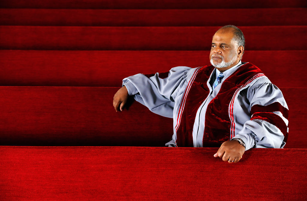pastor rice sitting in pew
